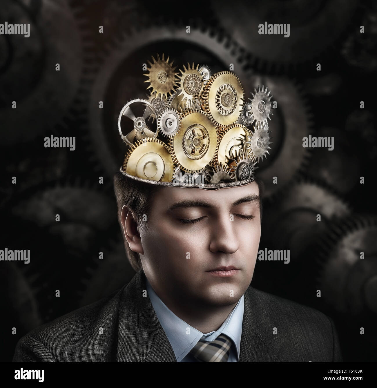 Man with cogwheel mechanism in his brain Stock Photo