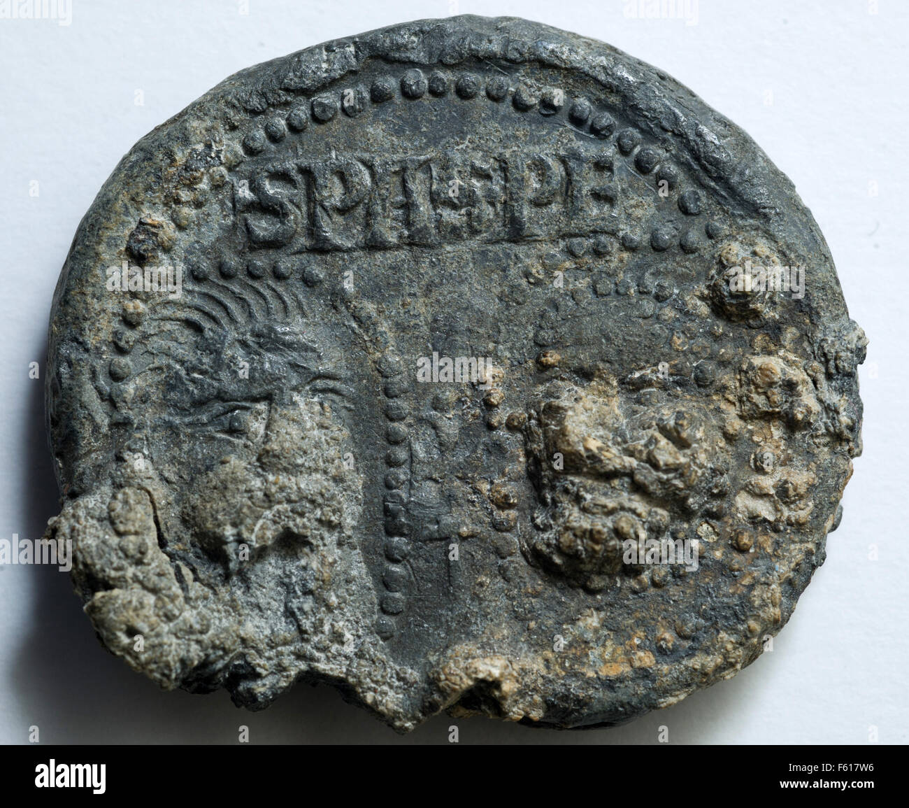 A papal seal of pope John XXII (1316-1334) discovered by archaeologists in the port of Greifswald, pictured in the town hall of Greifswald, Germany 10 November 2015. PHOTO: STEFAN SAUER/DPA Stock Photo