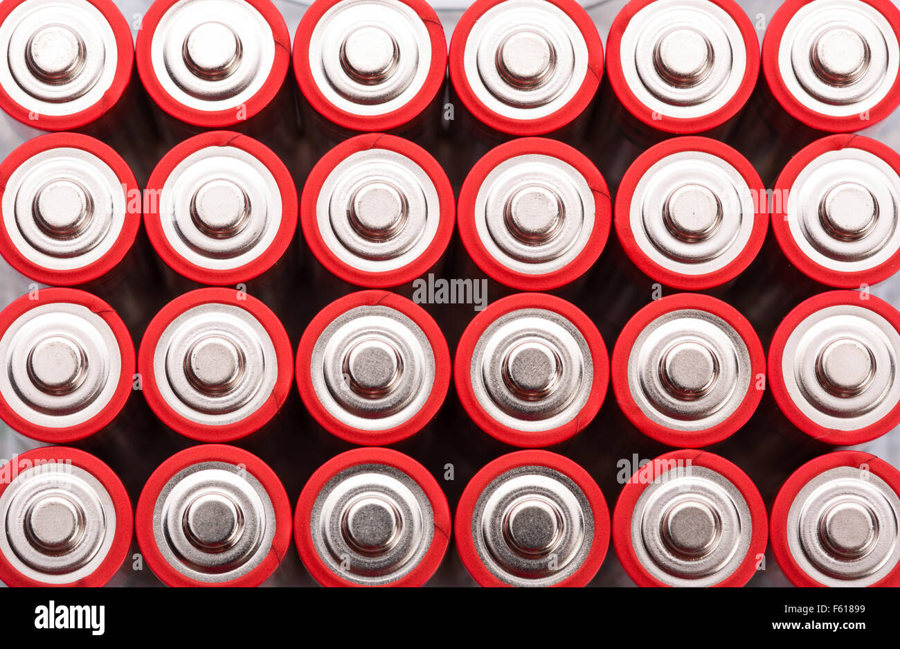 Background of red AA batteries Stock Photo Alamy