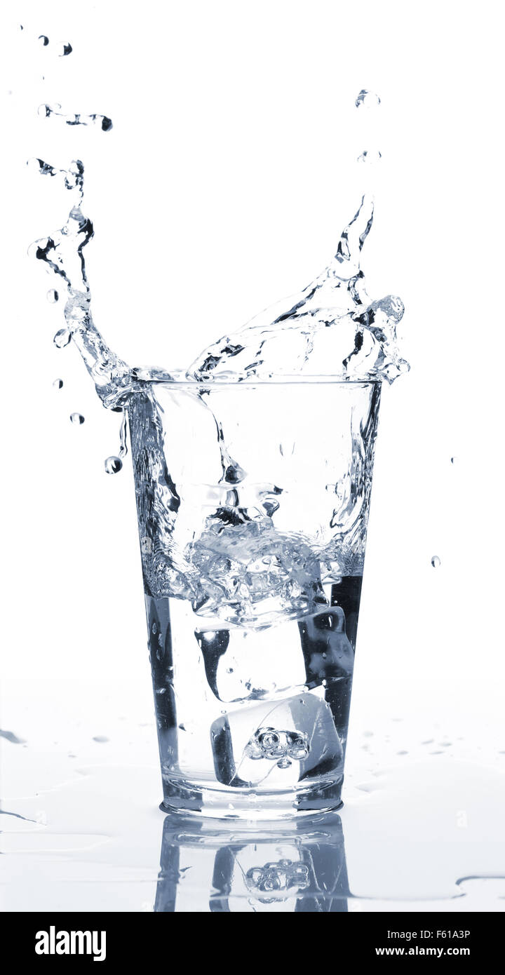 Glass of water with ice and splash. Isolated on white background Stock ...