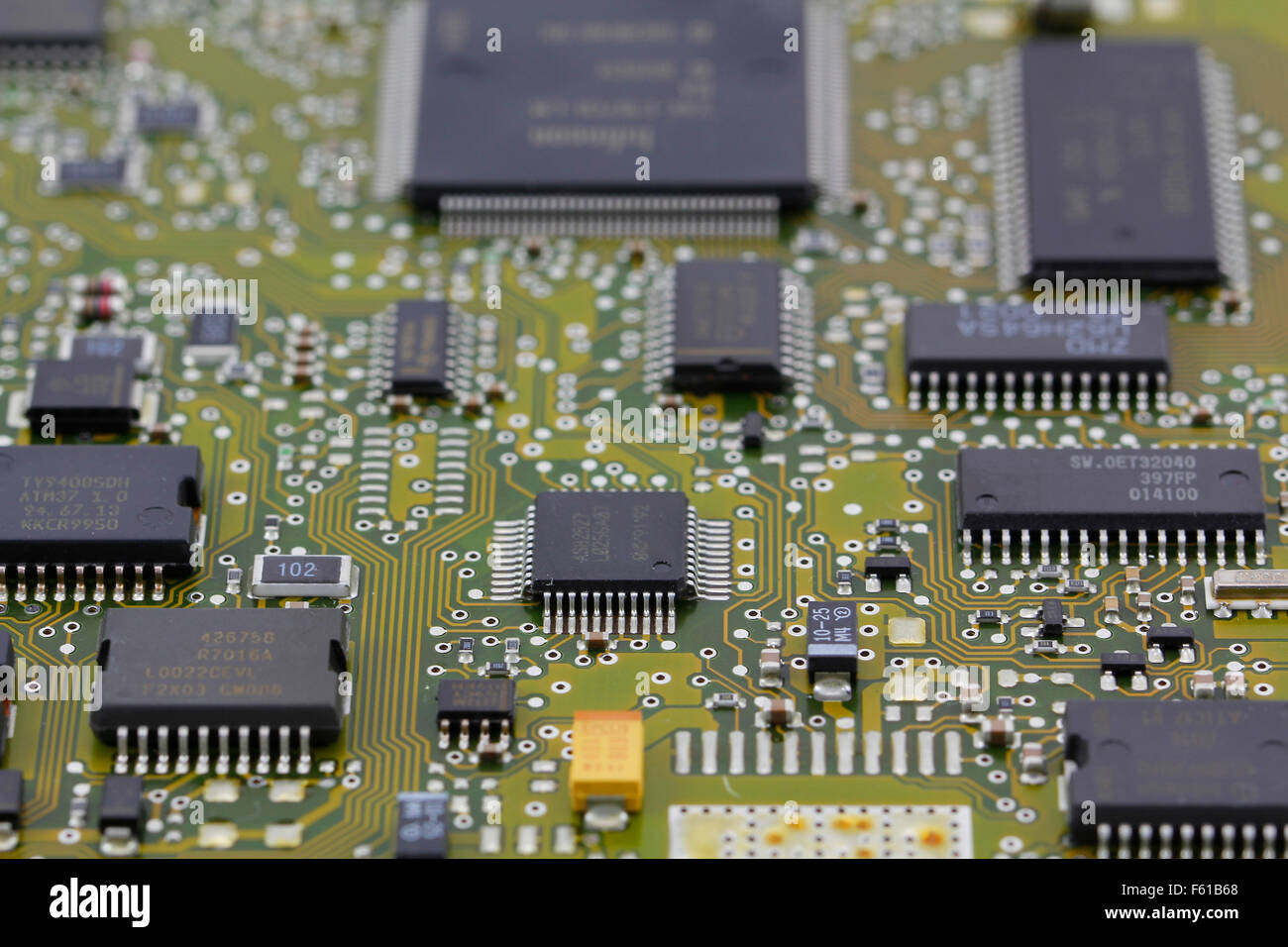 Microchips in a motherboard, electronic components Stock Photo