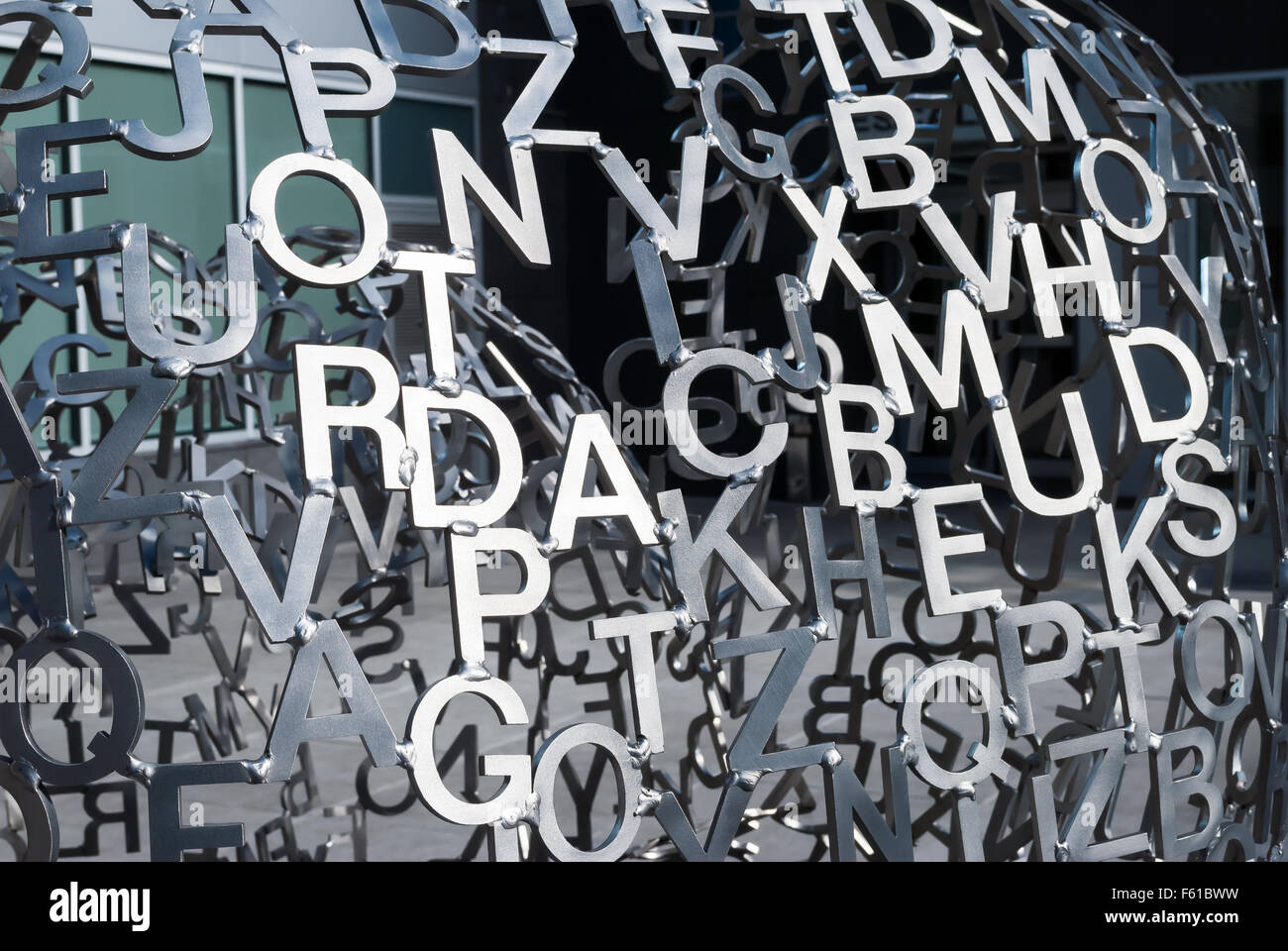 Lots of various metal letters connected to each other Stock Photo - Alamy
