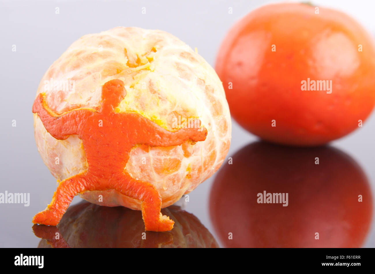 A Strong Man Of Peel Holding Big Mandarin Stock Photo Alamy