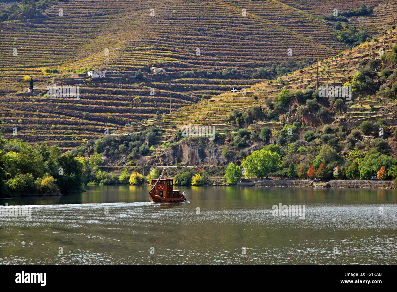 Cruising river Douro with a traditional boat called "barco rabelo