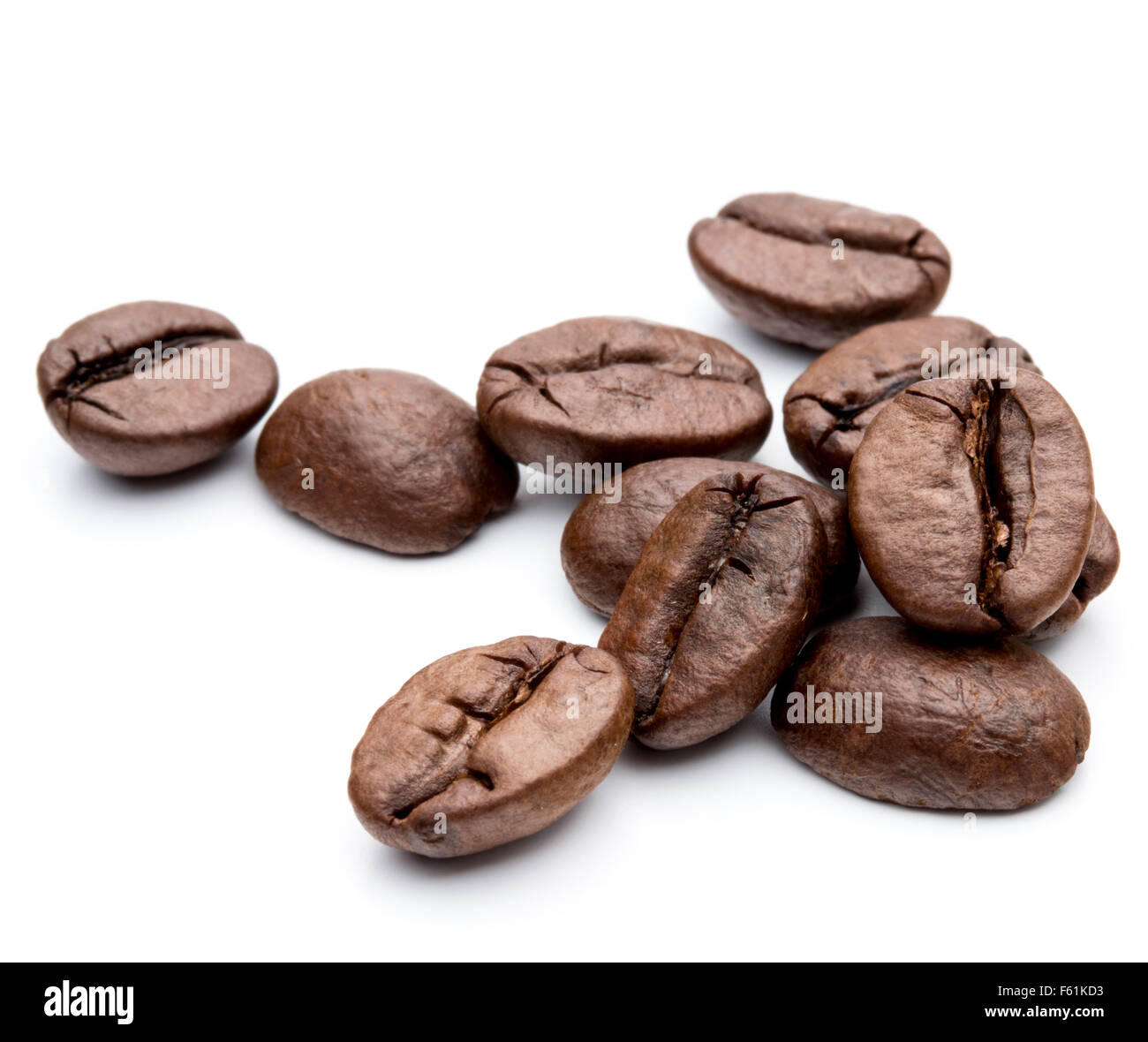 roasted coffee beans isolated in white background cutout Stock Photo ...