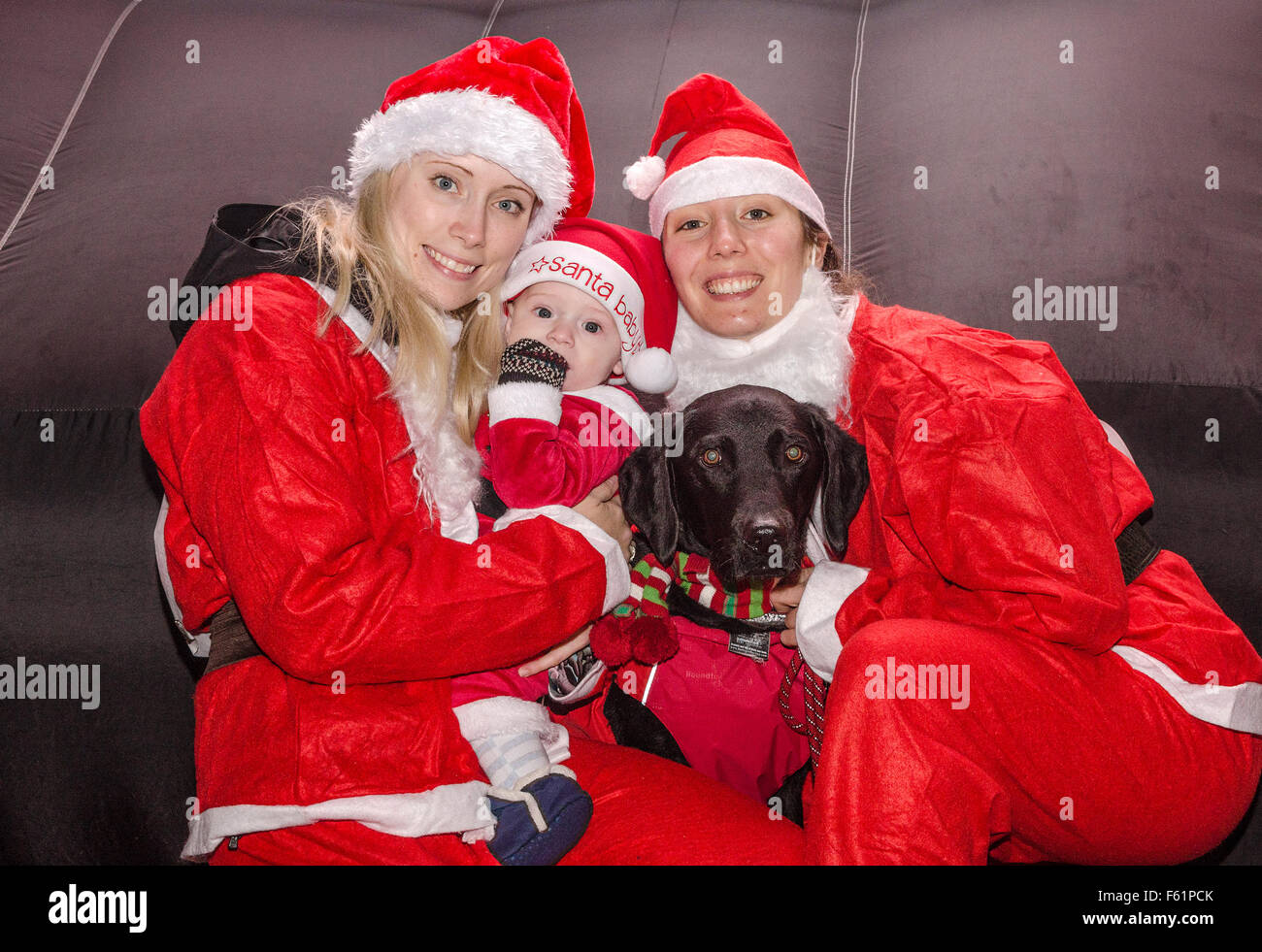 A charity santa fun run in truro, cornwall, uk Stock Photo