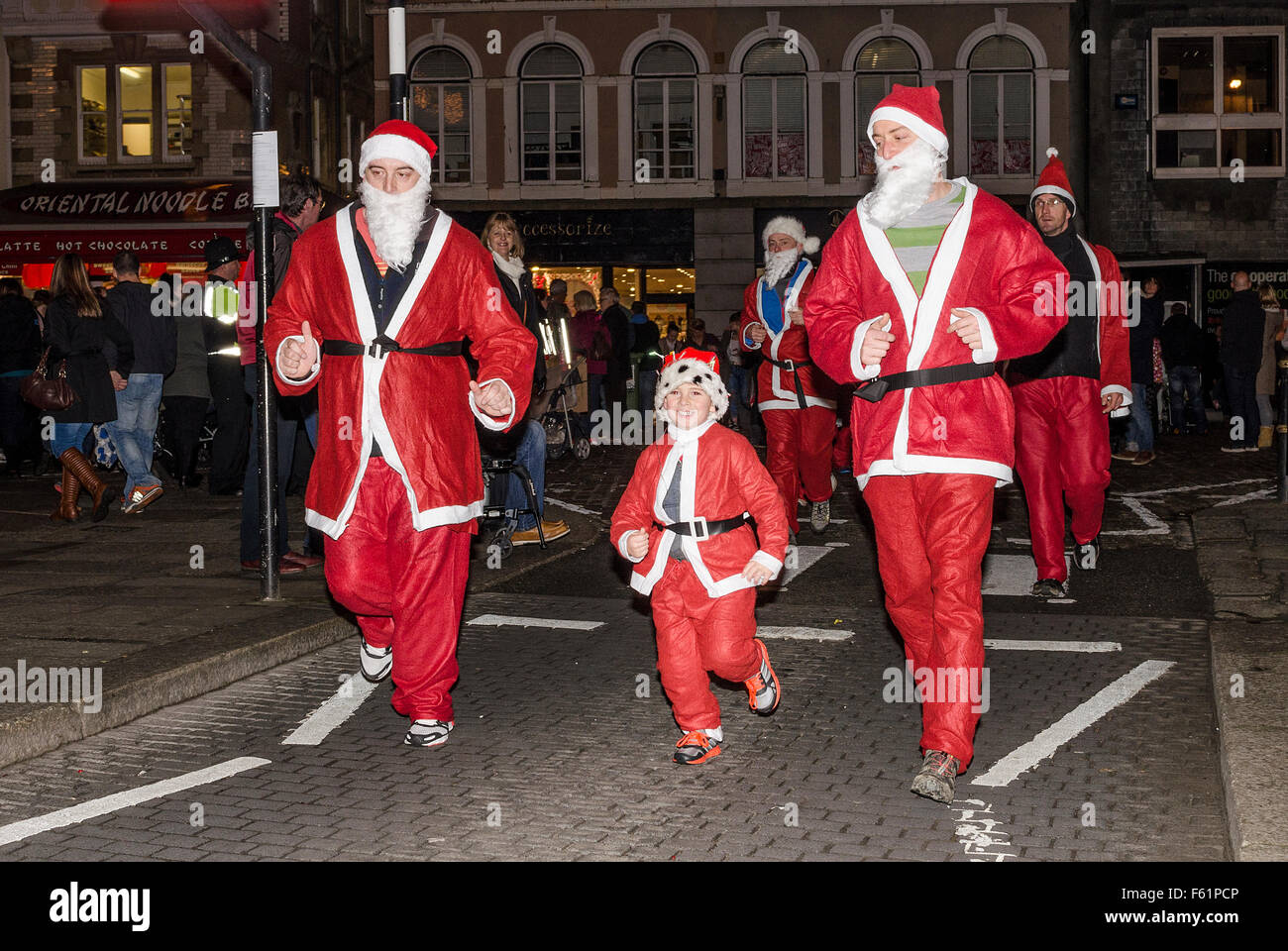 A charity santa fun run in truro, cornwall, uk Stock Photo
