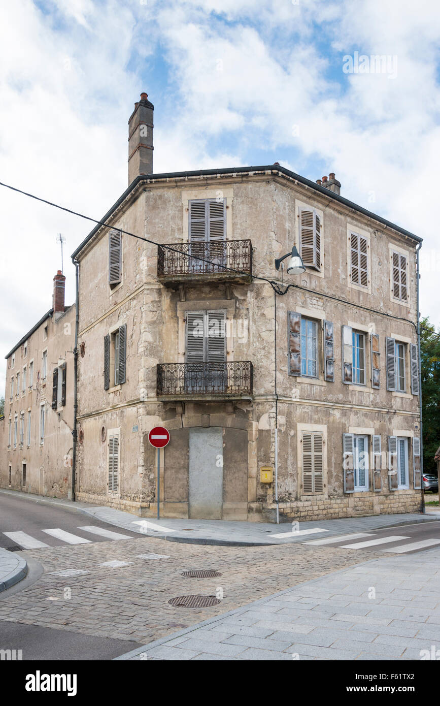 A French street scene in Chagny Burgundy France with an old building with shutters Stock Photo