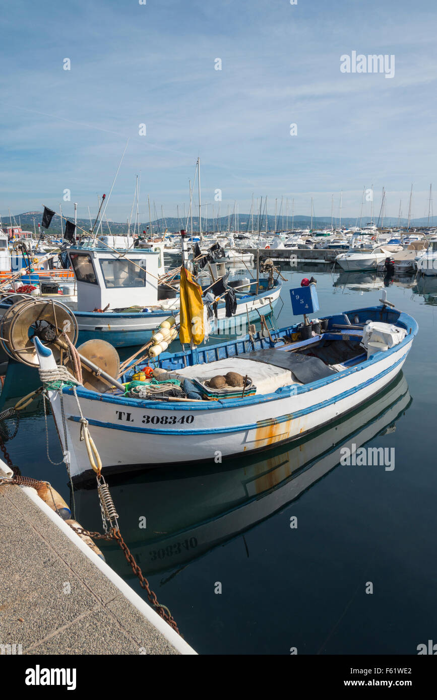 Small fishing boats moored in the harbour at Cavalaire on the French ...