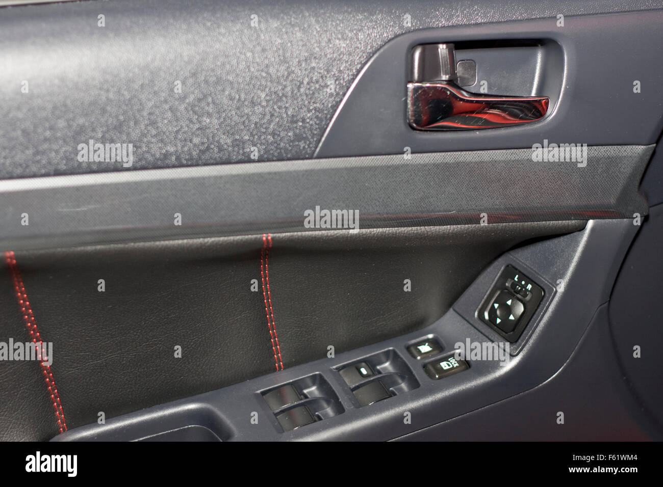 Car interior. Door with handle and buttons Stock Photo Alamy