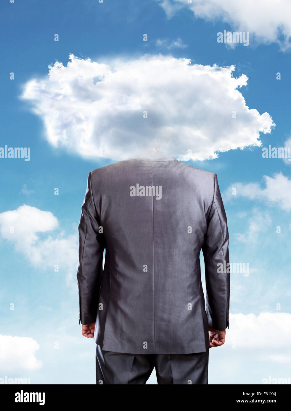 Businessman head in the clouds against blue sky Stock Photo - Alamy