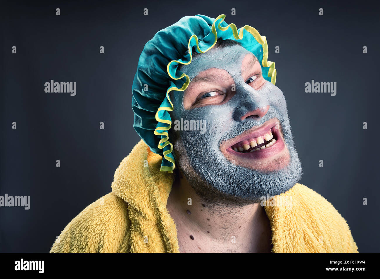 Crazy man with face pack. Closeup view Stock Photo