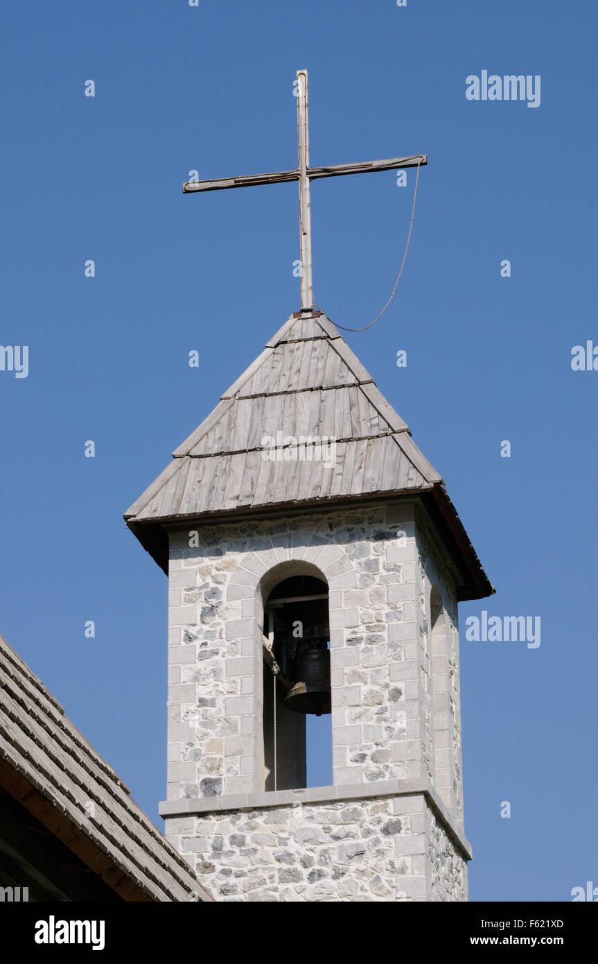 The shingled bell tower of the nineteenth century Roman Catholic church in Theth. Stock Photo