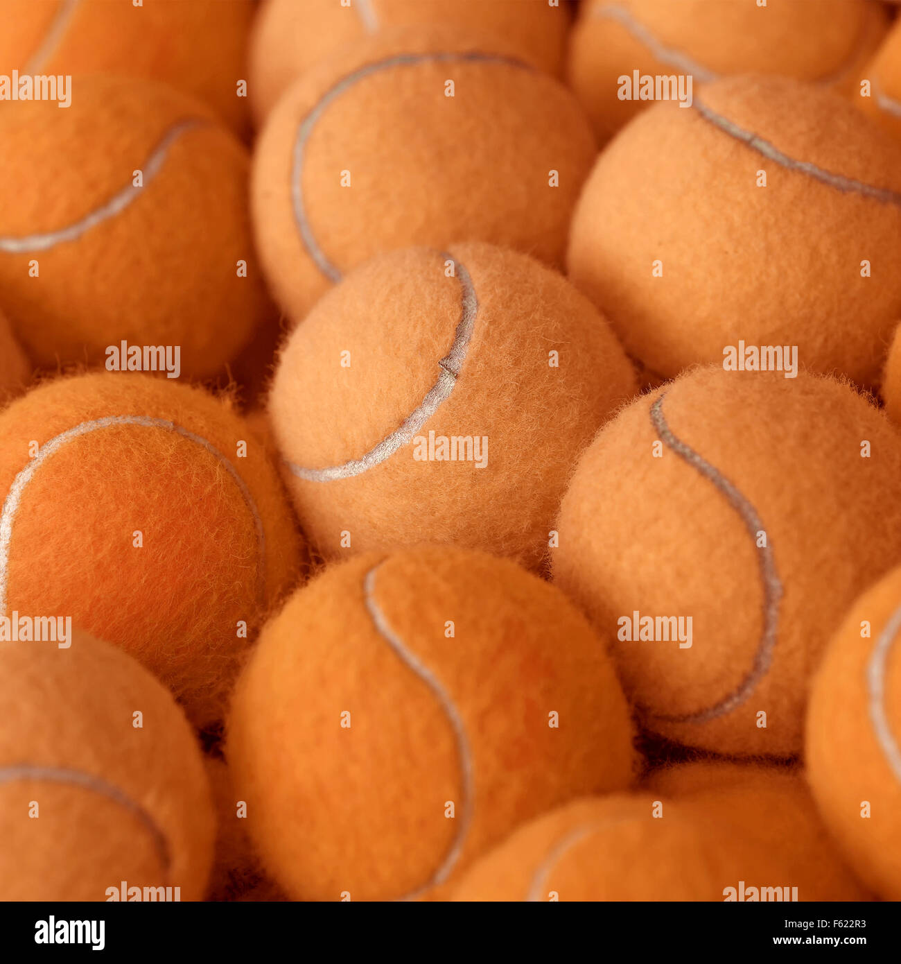exotic orange tennis ball as sport background Stock Photo Alamy