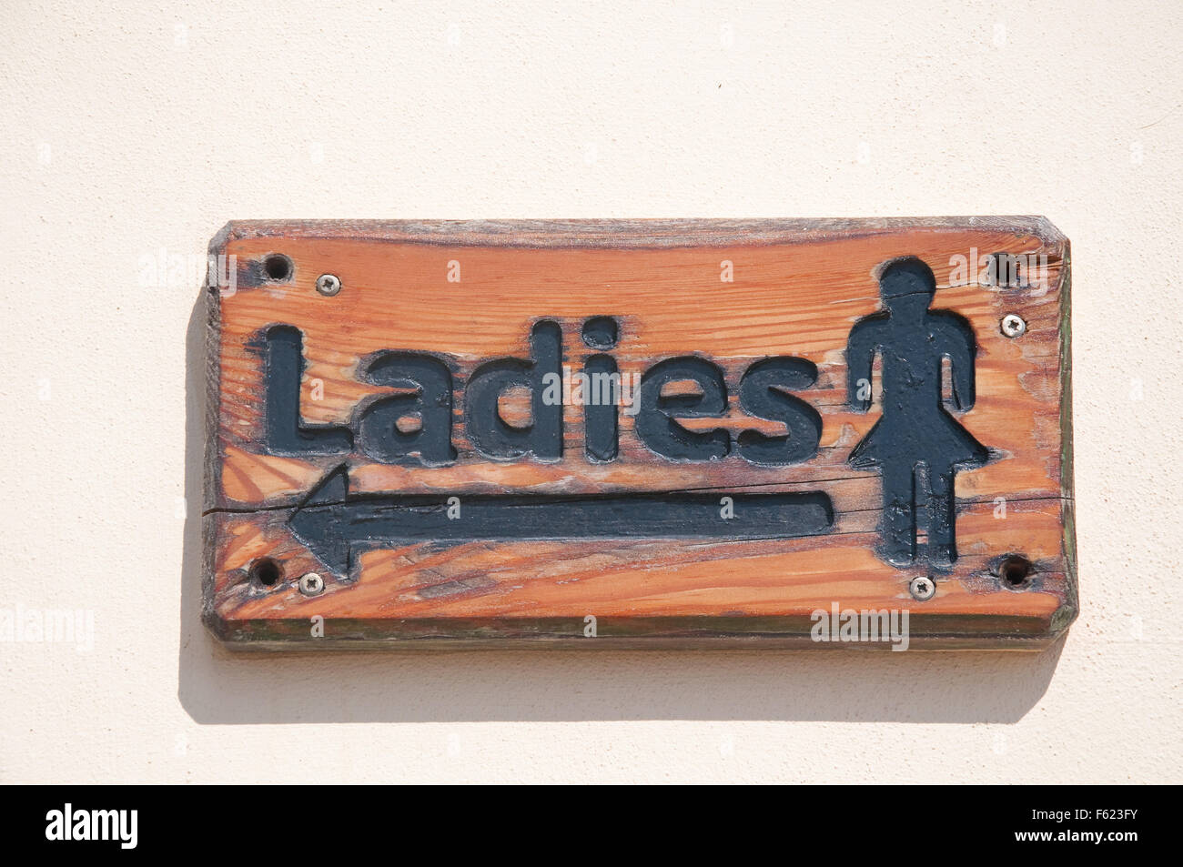 Signs indicating the direction to be taken by the ladies Stock Photo