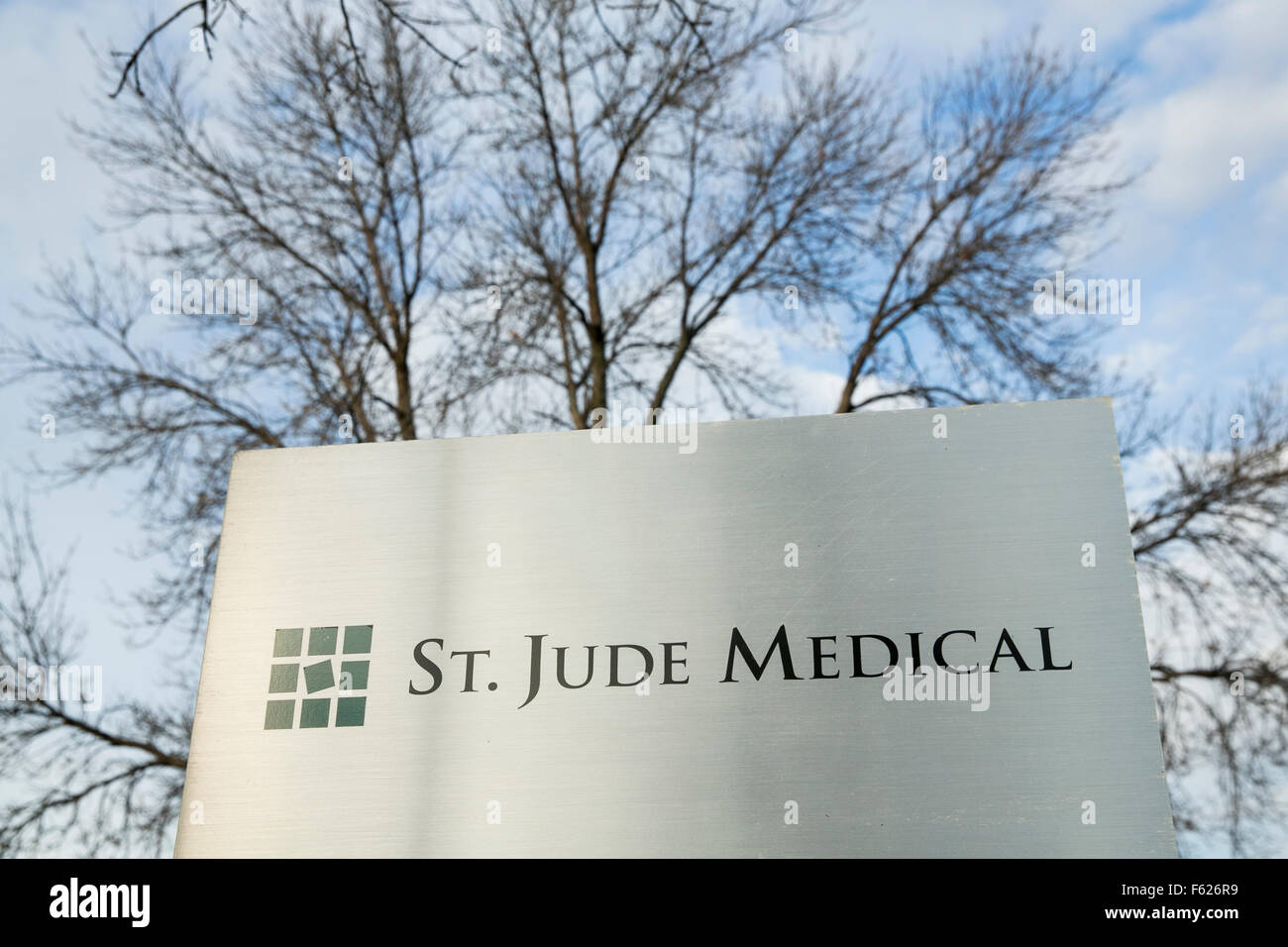 A logo sign outside of the headquarters of St. Jude Medical, Inc., in St. Paul, Minnesota on October 25, 2015. Stock Photo