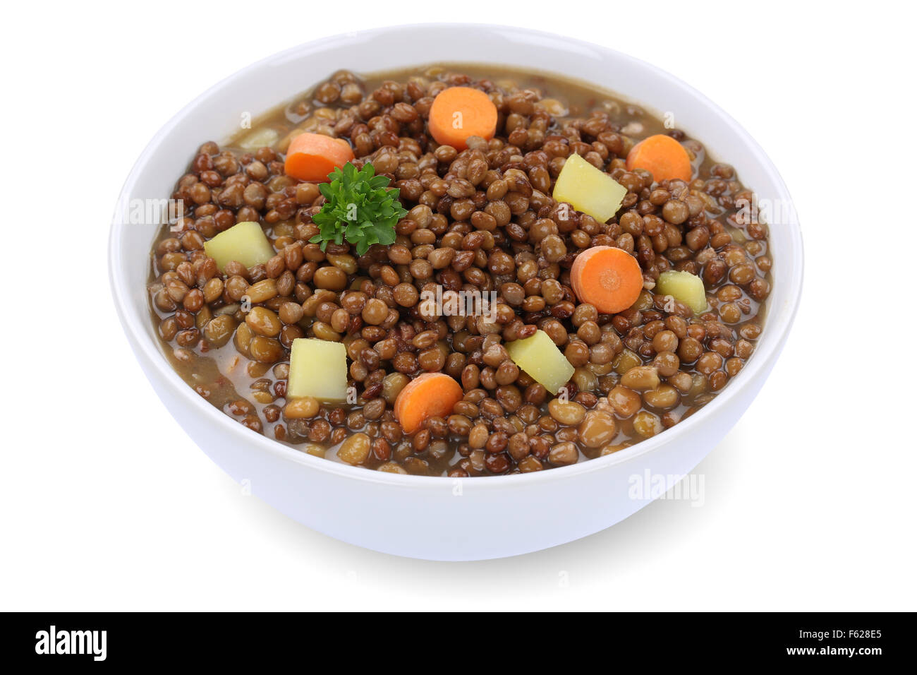 Lentil soup stew meal with lentils in bowl isolated on a white background Stock Photo