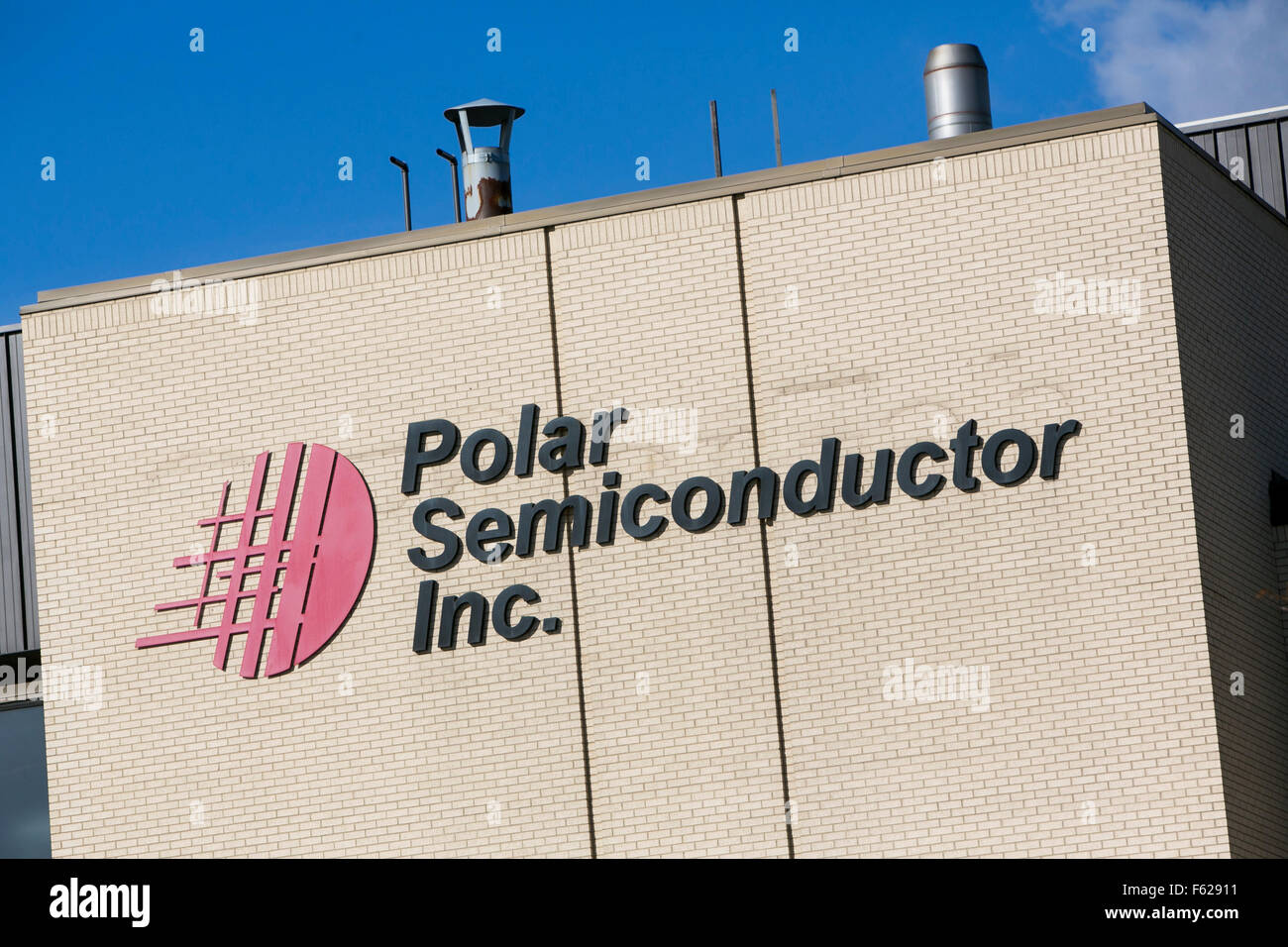 A logo sign outside of a facility occupied by Polar Semiconductor, Inc., in Bloomington, Minnesota on October 24, 2015. Stock Photo