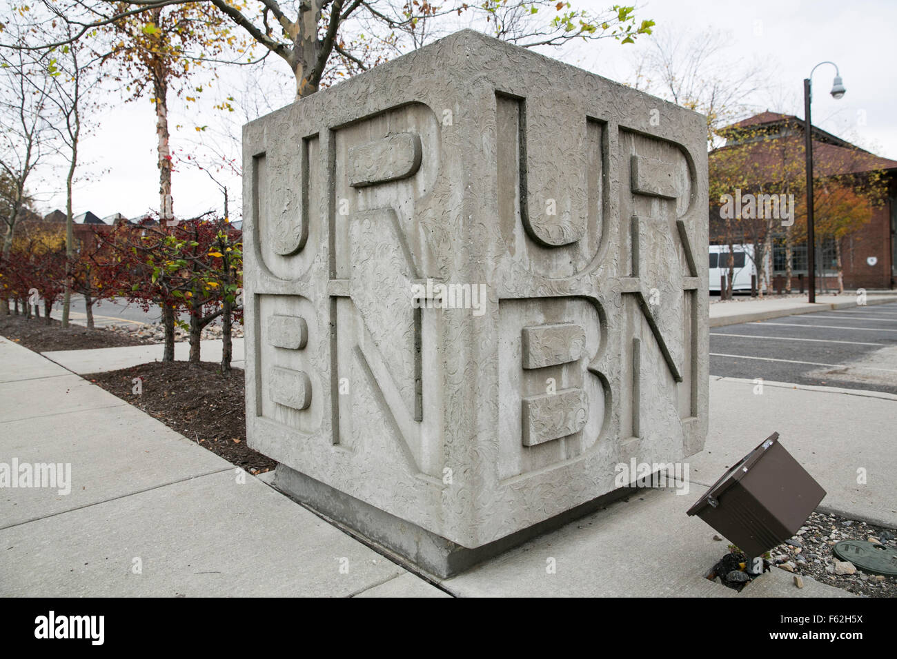 A logo sign outside of the headquarters of Urban Outfitters, Inc., in
