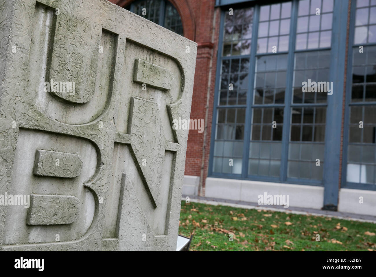 A logo sign outside of the headquarters of Urban Outfitters, Inc., in