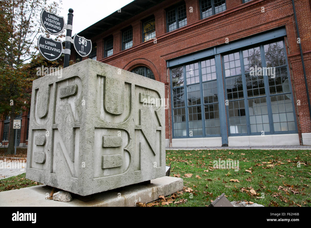 A logo sign outside of the headquarters of Urban Outfitters, Inc., in