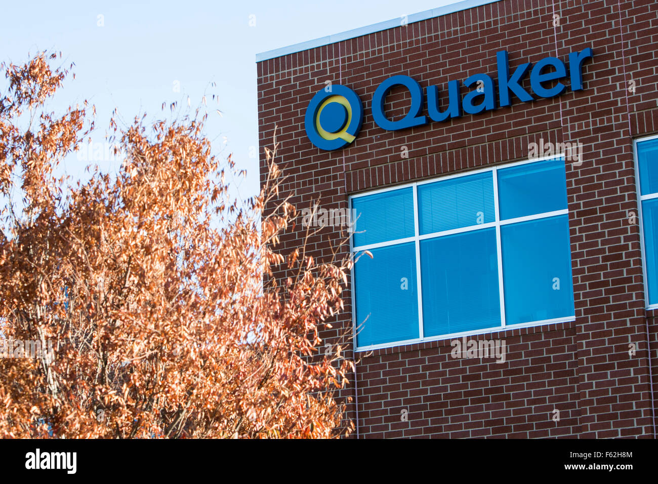 A logo sign outside of the headquarters of the Quaker Chemical Corporation in Conshohocken, Pennsylvania on November 8, 2015. Stock Photo