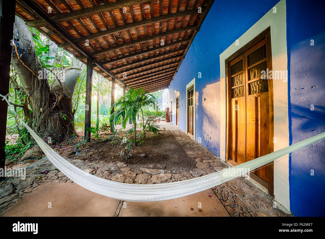 Hammock outside a room at the San Jose Cholul hacienda in Yucatan, Mexico. Stock Photo