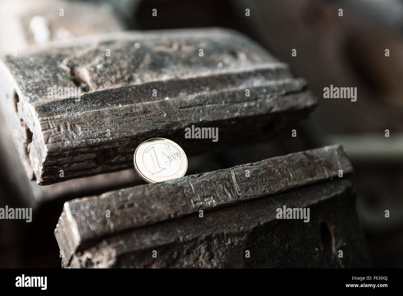 Metal Bench Vice With Euro Coin In The Workshop Stock Photo