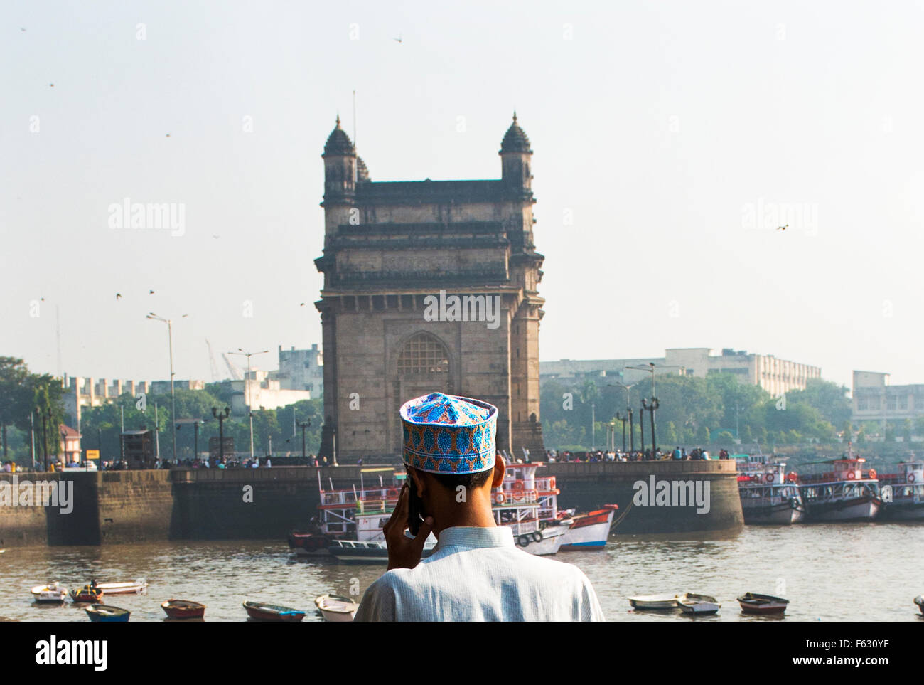 An Indian Muslim man by the Gateway of India in Mumbai. Stock Photo