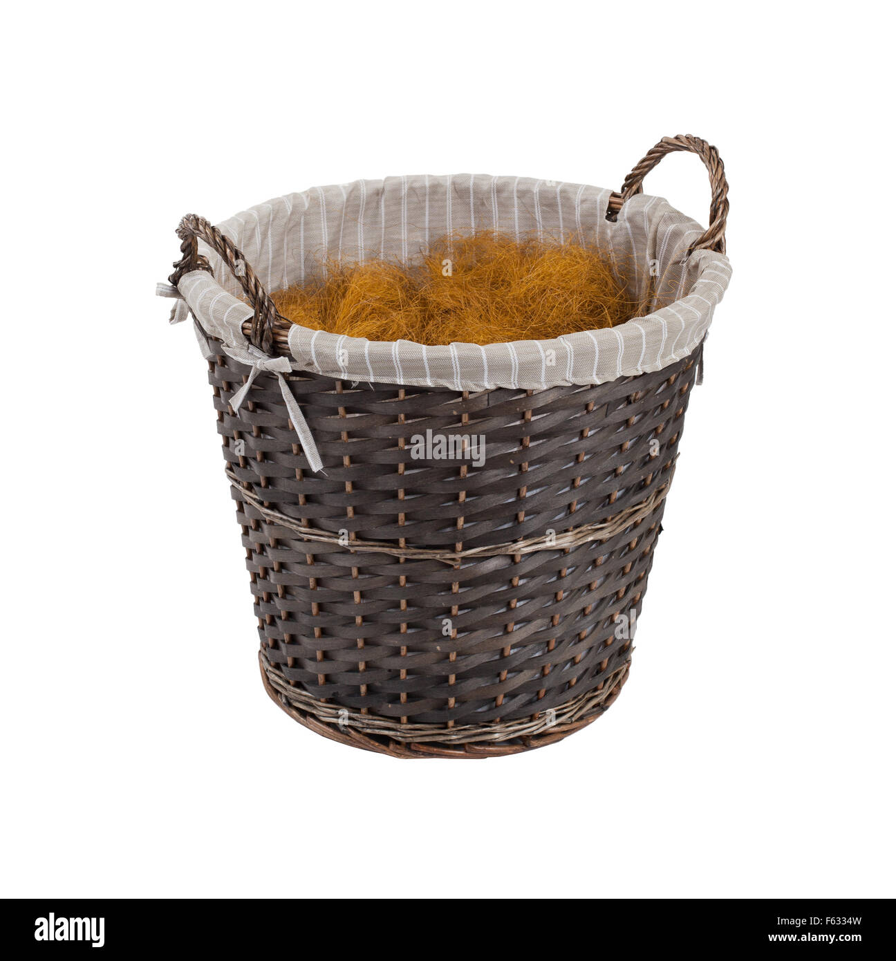 Dark rattan basket isolated on a white background Stock Photo