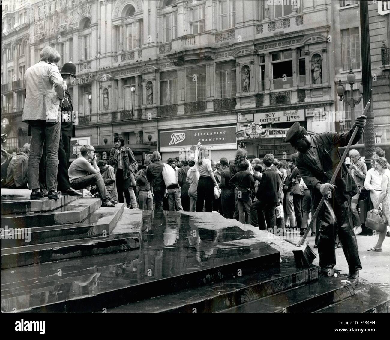 1968 - IS LONDON BECOMING SHAMEFUL? Piccadilly, Green Park, Leicester Square - places for London to be proud of - or to be ashamed of, For these are the places that have been virtually taken over by crowds of hippies, beatniks and dropouts. Day and night they are to be found littering ''Eros Island'' - the area surrounding the Eros Statue, London's most famous landmark, at Piccadilly Circus. Lounging around the steps and pavements they will spend the entire day there, young people from all over the world, until the police move them on - generally to what has become a shanty town - Green Park, Stock Photo