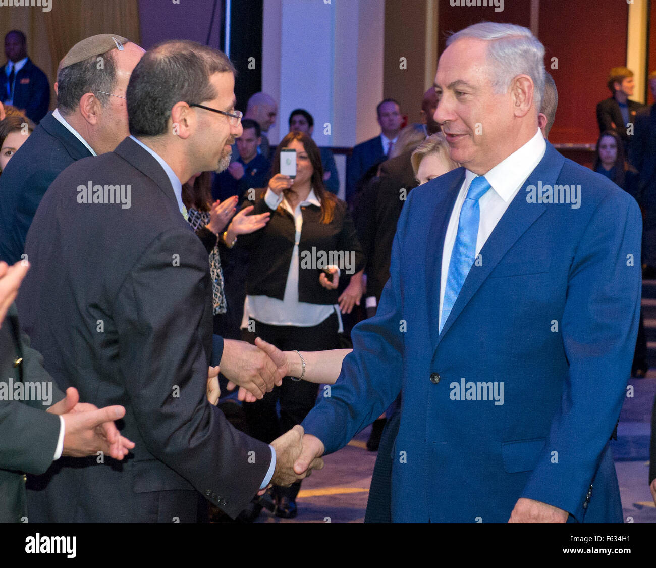 Washington DC, USA. 10th Nov, 2015. Prime Minister Benjamin Netanyahu of Israel, right, shakes hands with United States Ambassador to Israel Dan Shapiro, left, as he arrives to address the 2015 Jewish Federations of North America General Assembly at the Washington Hilton Hotel in Washington, DC on Tuesday, November 10, 2015. Credit: Ron Sachs/CNP - NO WIRE SERVICE - Credit:  dpa picture alliance/Alamy Live News Stock Photo