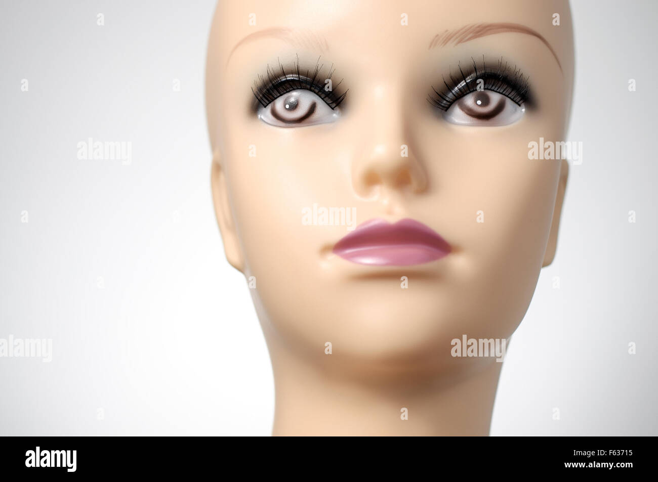 Closeup of mannequin head on grey background Stock Photo Alamy