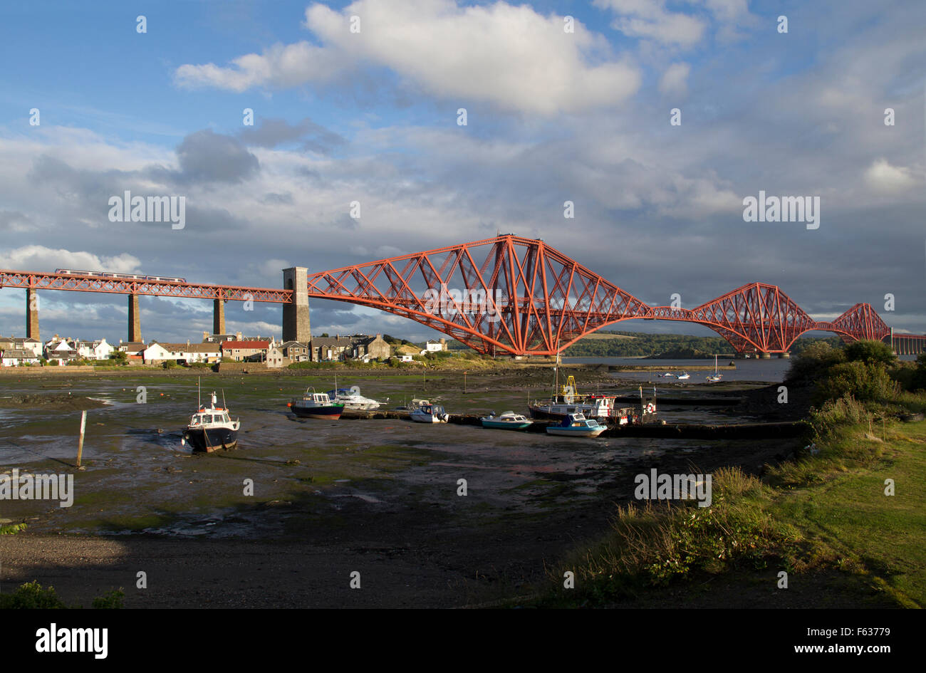 A train crossing the Forth railway bridge over the Firth of Forth in Scotland. Stock Photo