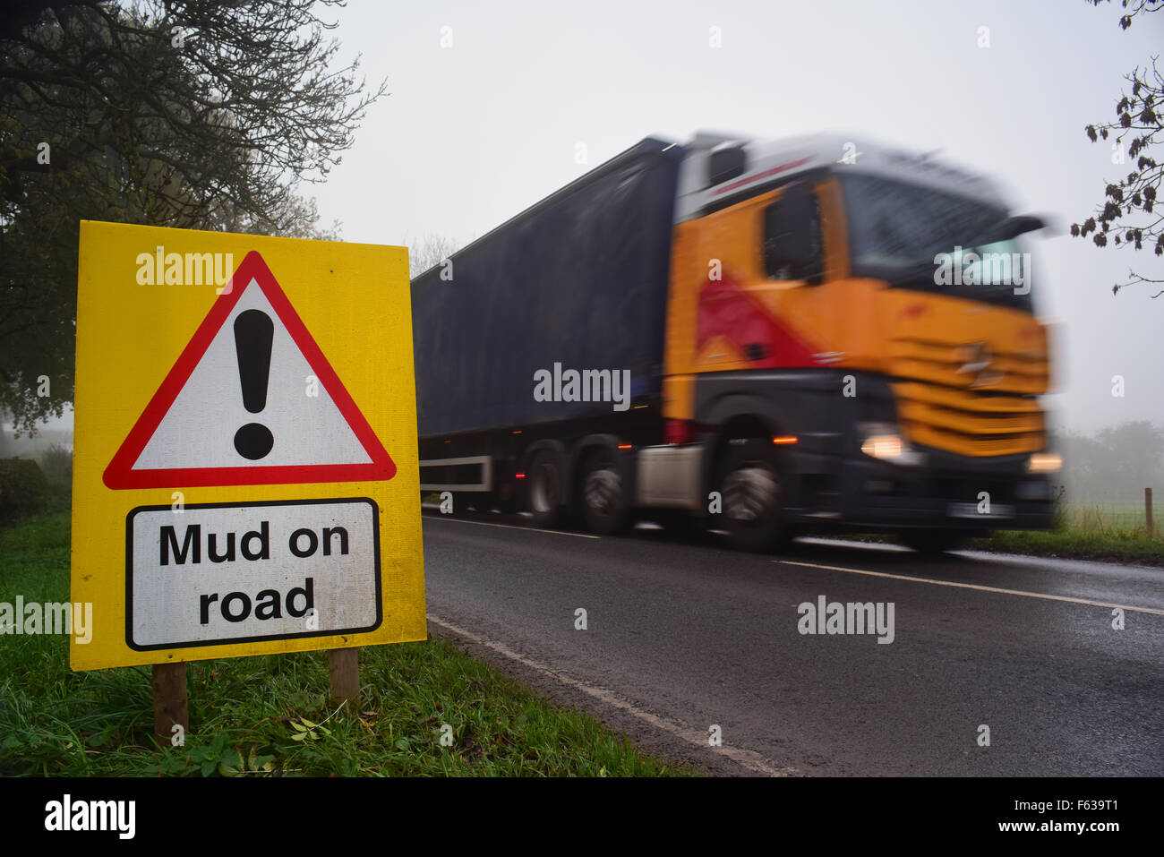 mud on road ahead warning sign yorkshire united kingdom Stock Photo