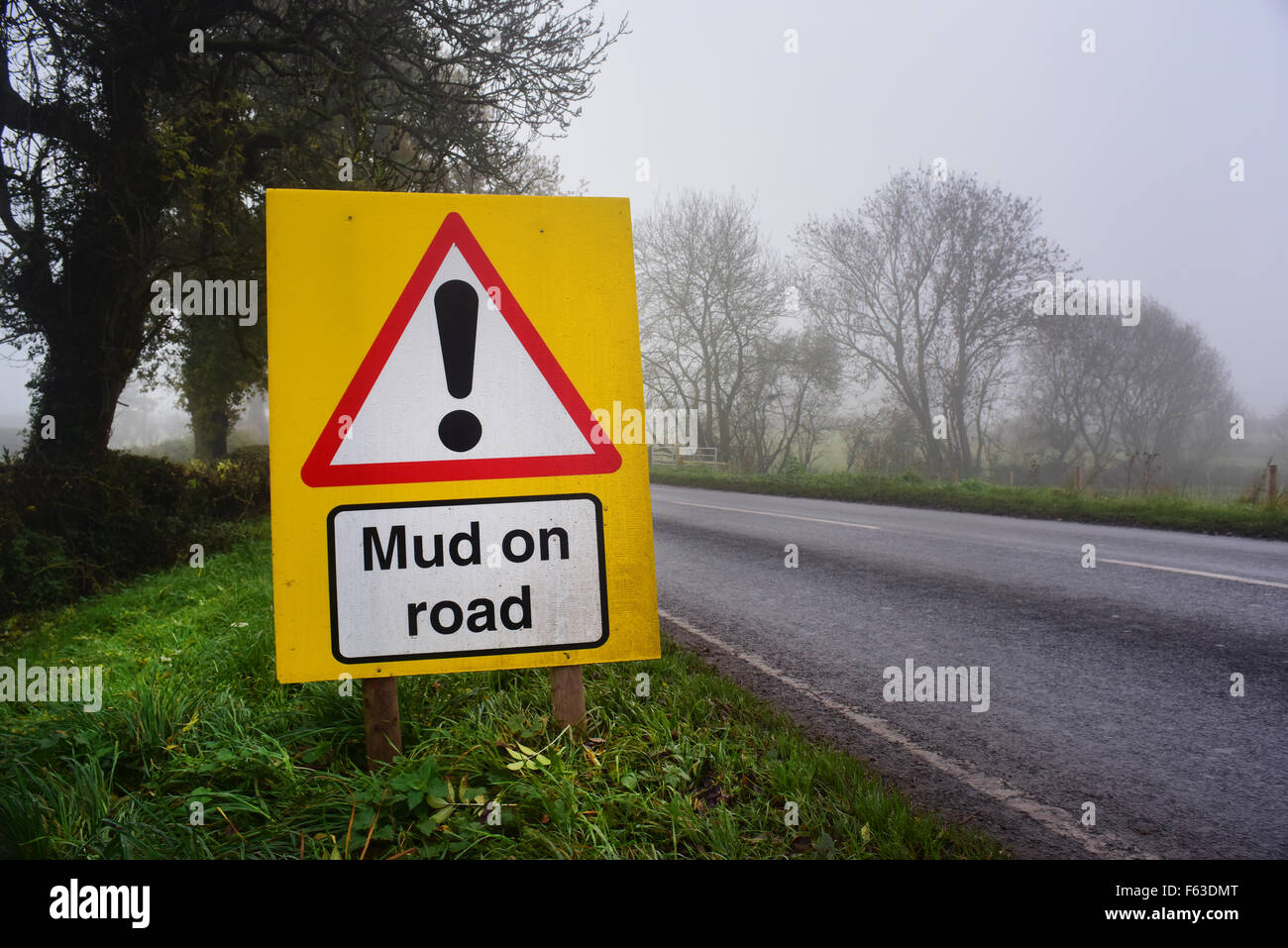 mud on road ahead warning sign yorkshire united kingdom Stock Photo