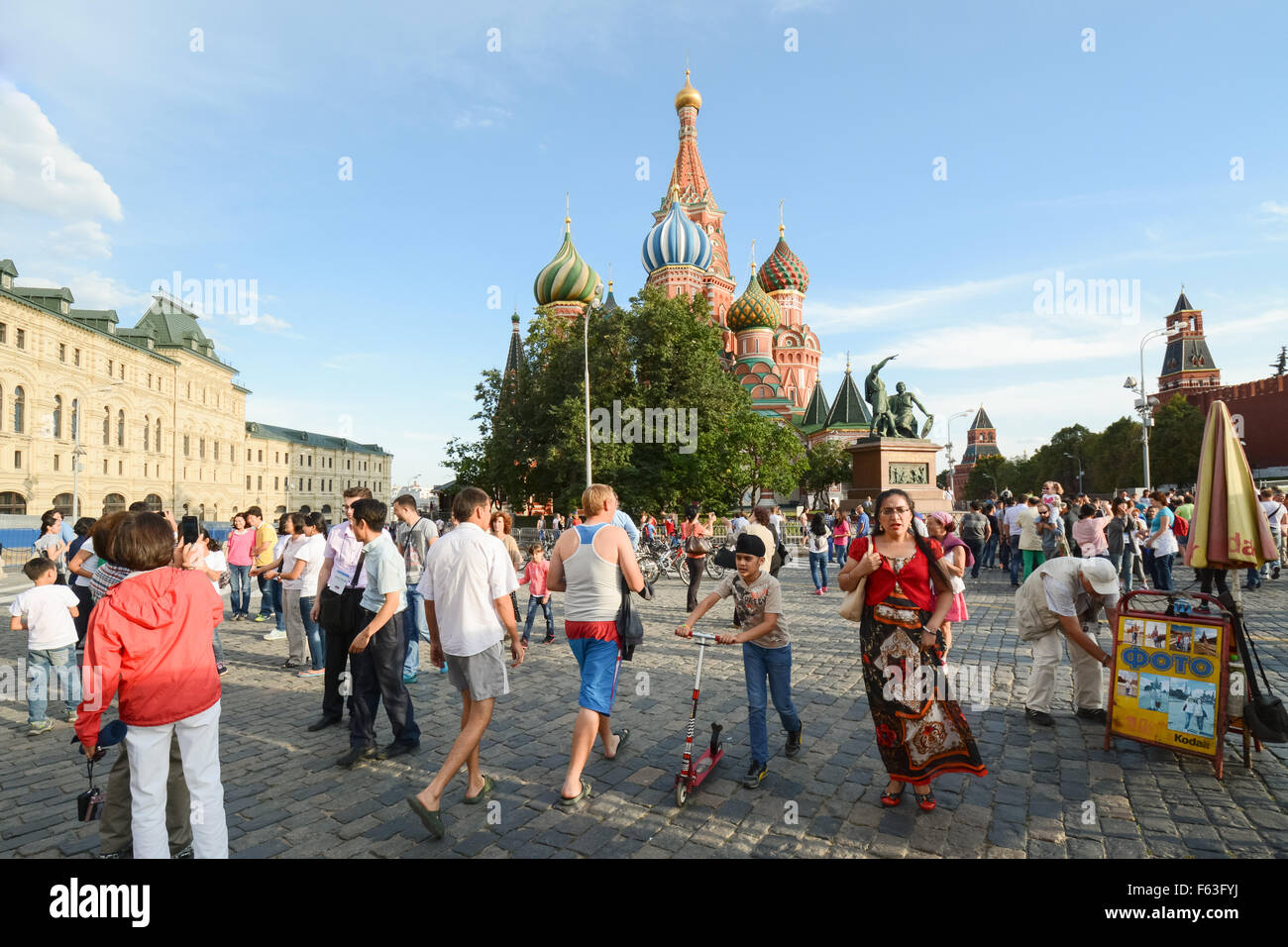 people tourists of different nationalities visiting St Basil's Saint Basil's Cathedral in Moscow, Red Square,  Russia Stock Photo