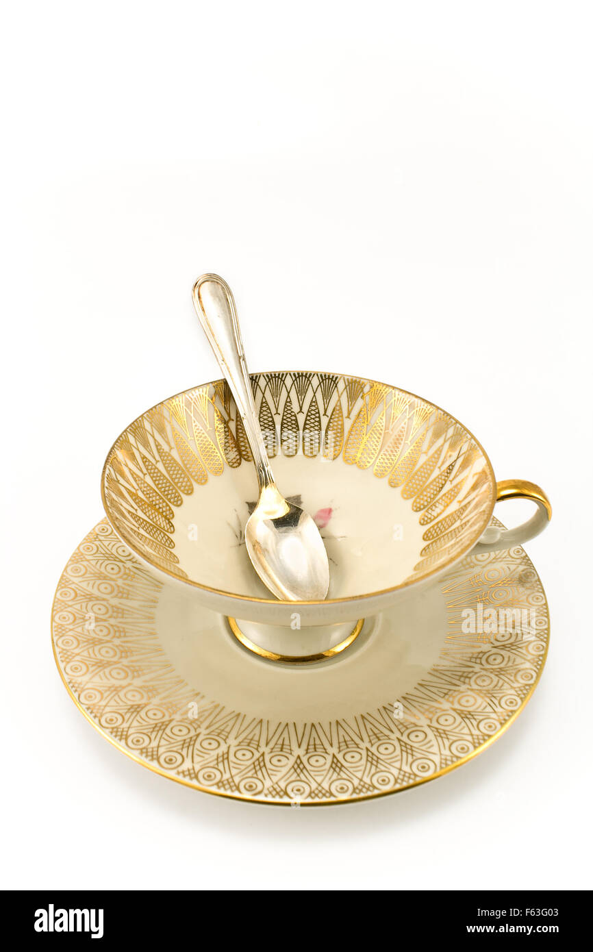 Antique porcelain tea cup isolated on white Stock Photo