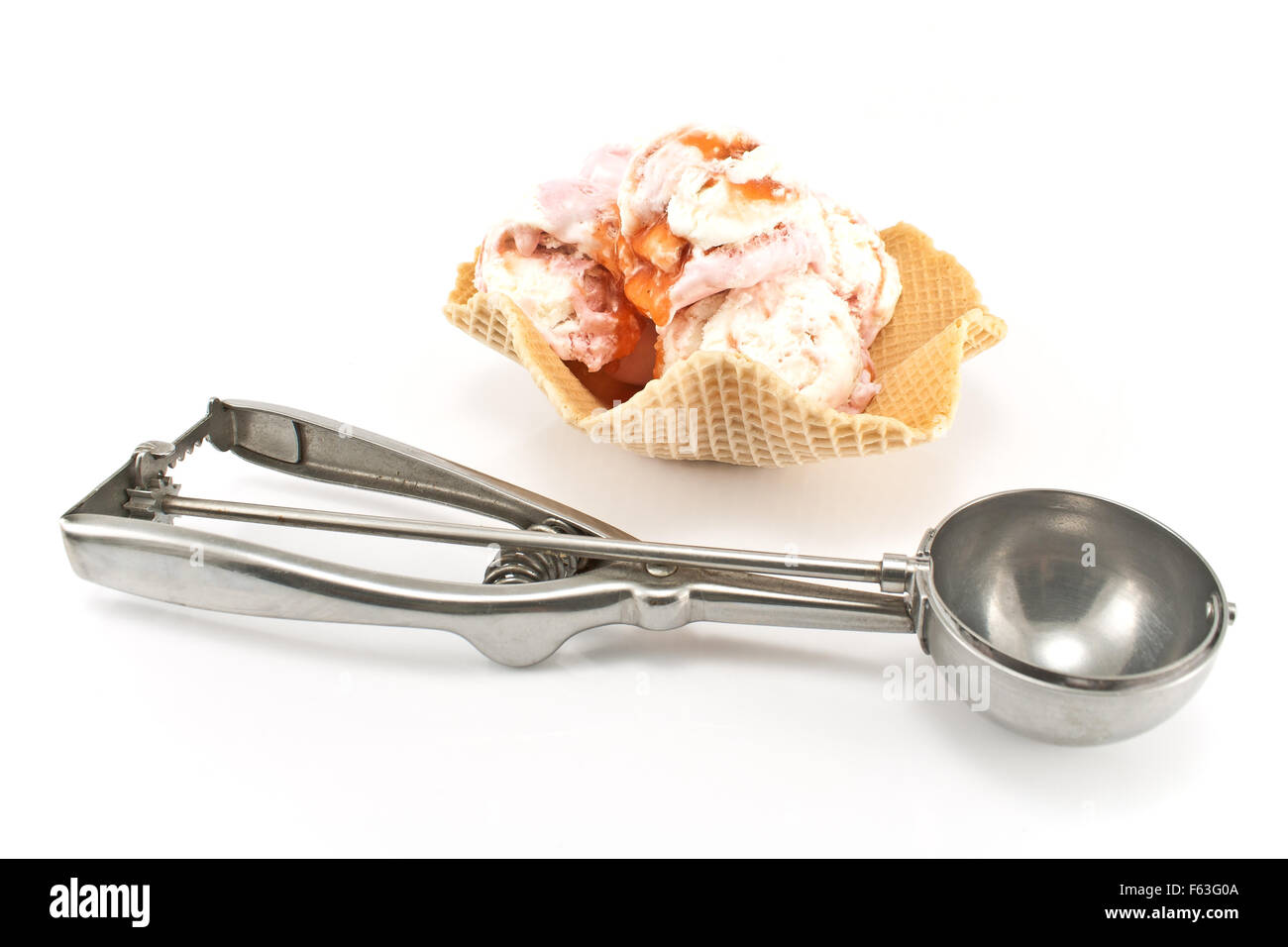 Scoop with ice cream isolated on white Stock Photo