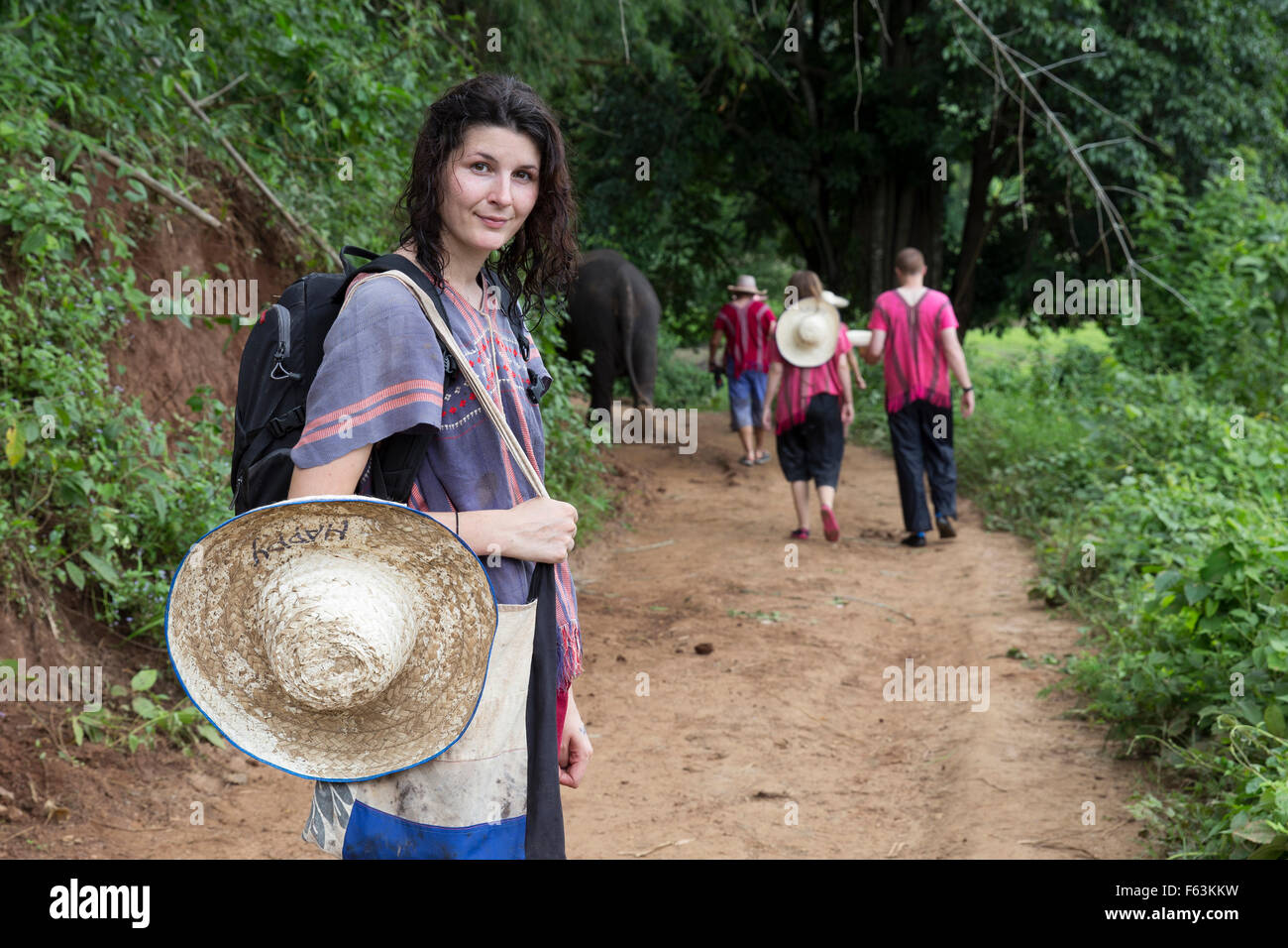 Tourist at an elephant sanctuary in Thailand Stock Photo