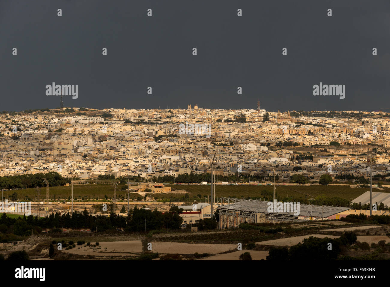 Views across Malta towards Mosta. Stock Photo