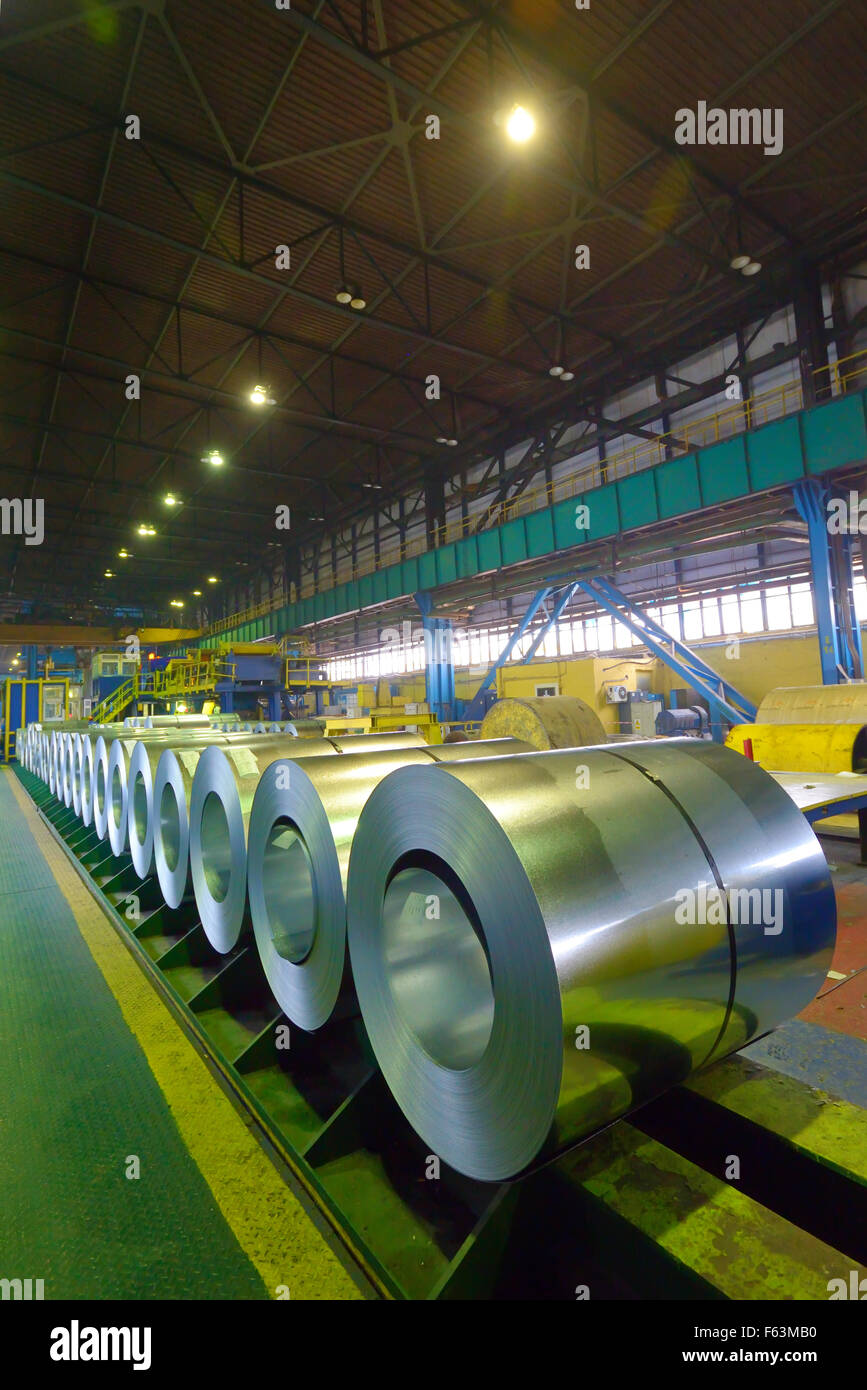 rolls of steel sheet inside of steel plant Stock Photo
