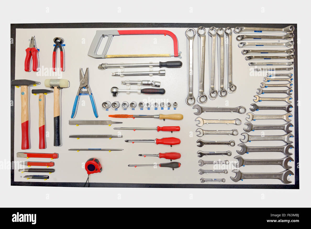 Hand tools nicely organized at wall board Stock Photo