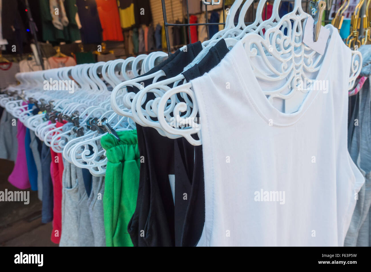 Clothes on hangers in a clothes shop Stock Photo Alamy