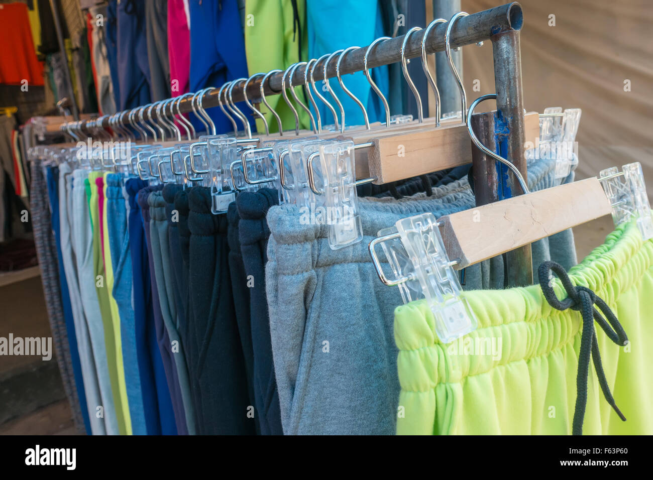 Clothes on hangers in a clothes shop Stock Photo Alamy