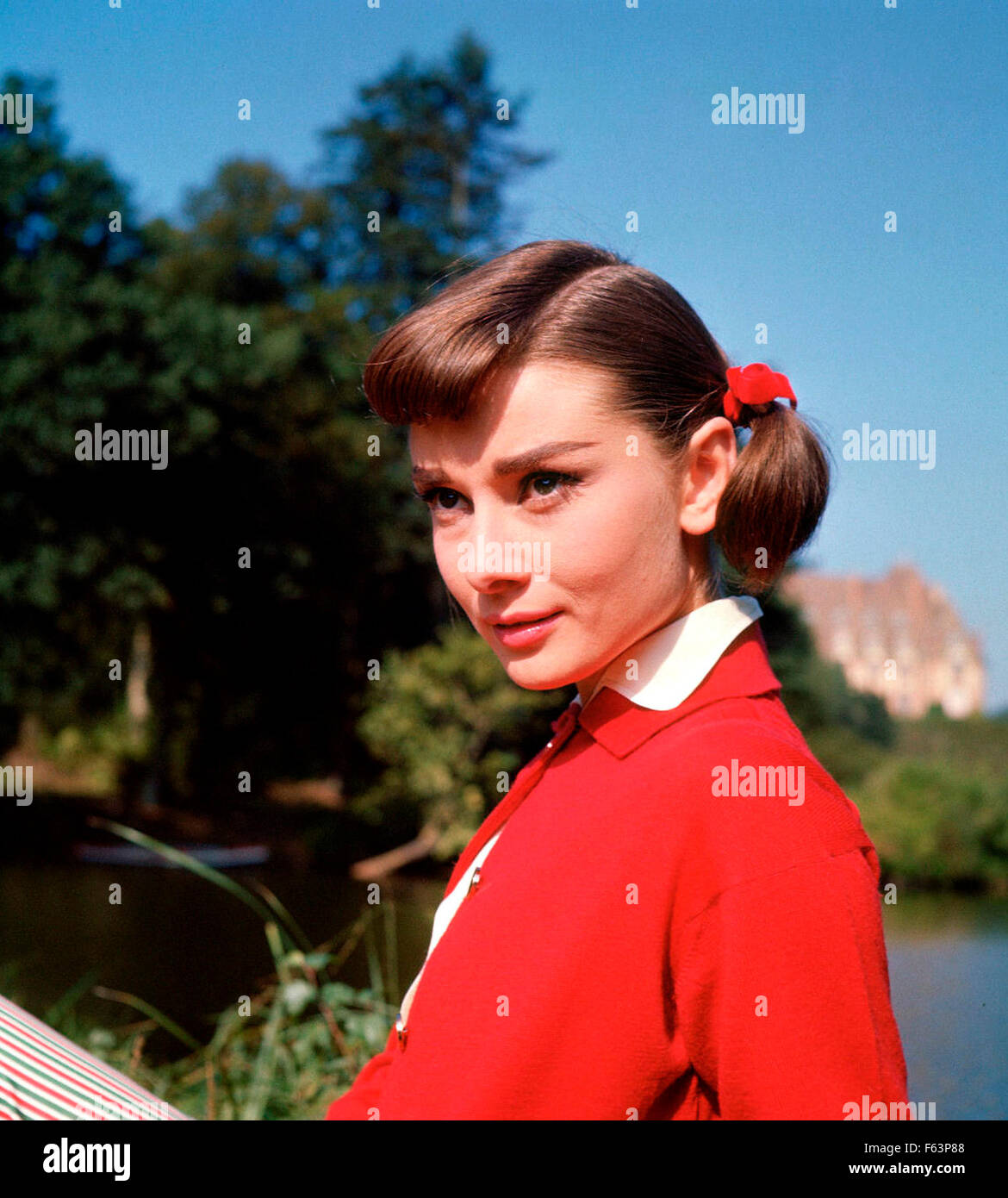 LOVE IN THE AFTERNOON 1957 Allied Artists film with Audrey Hepburn during a break in filming at the Chateau de Vitry, Gambais, Stock Photo