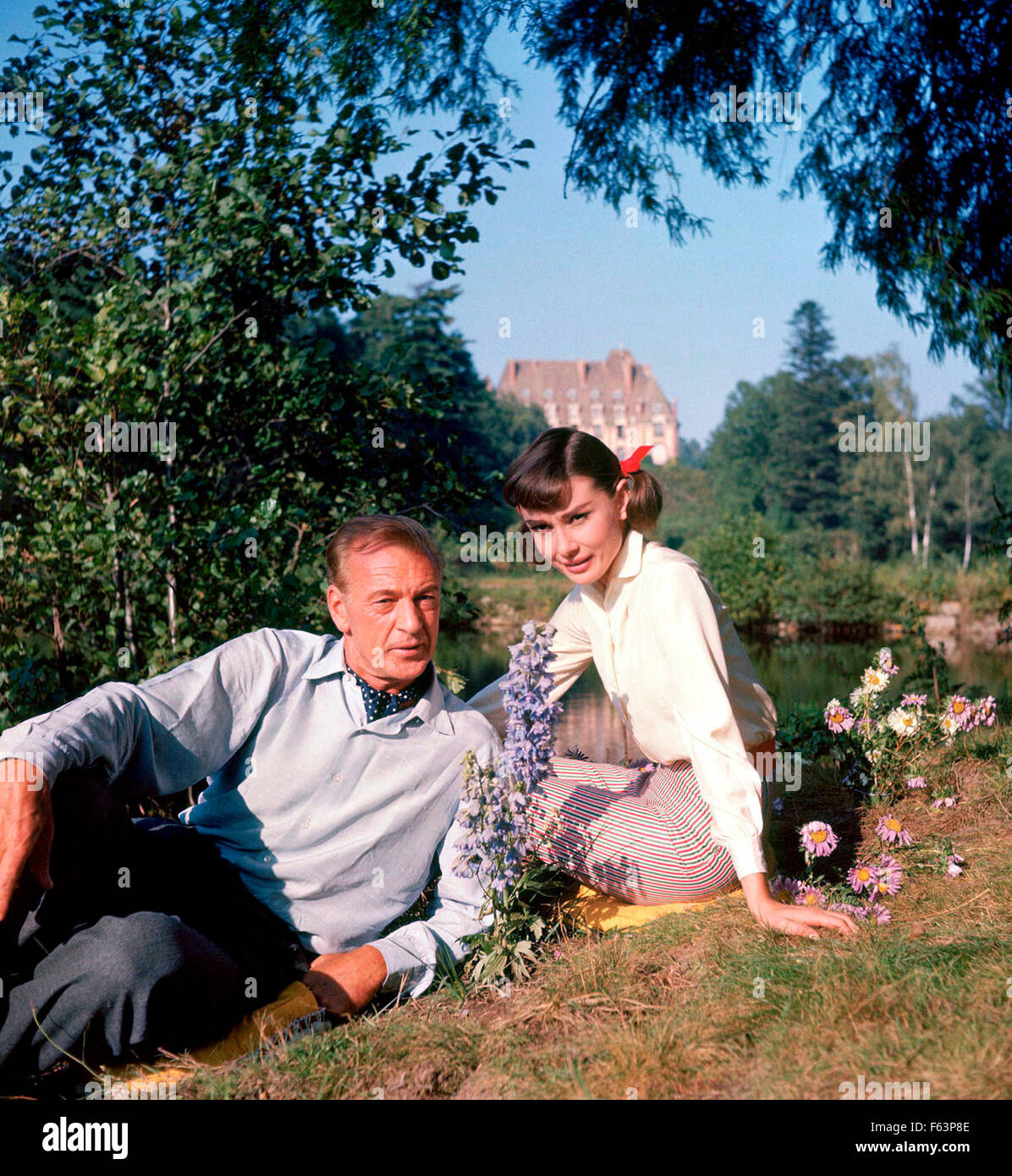 LOVE IN THE AFTERNOON 1957 Allied Artists film with Audrey Hepburn and Gary Cooper during a break in filming at the Chateau de Vitry, Gambais, Stock Photo