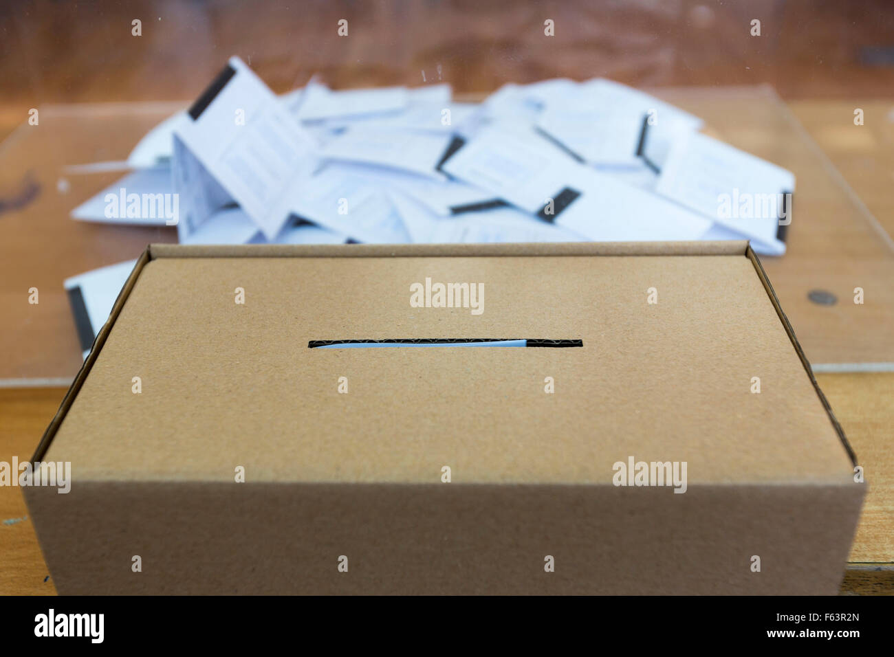 Paper voting box in front of a ballot box in Bulgaria. Stock Photo