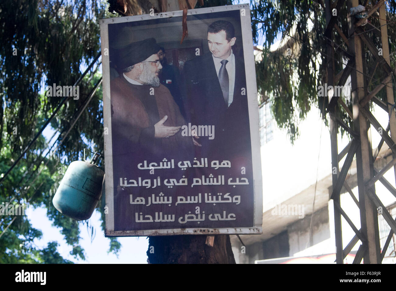 Beirut Lebanon, 11th November 2015. A poster showing President Assad of Syria (R) together with Hassan Nasrallah the Lebanese spiritual Leader of the paramilitary group Hezbollah Credit:  amer ghazzal/Alamy Live News Stock Photo