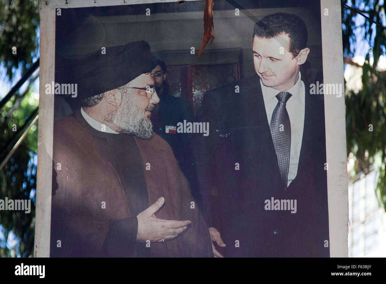 Beirut Lebanon, 11th November 2015. A poster showing President Assad of Syria (R) together with the Lebanese spiritual Leader of the paramilitary group Hezbollah  Hassan Nasralla Credit:  amer ghazzal/Alamy Live News Stock Photo